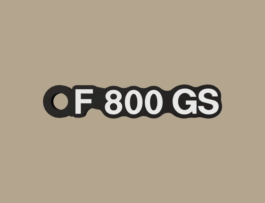 Llavero BMW Motorrad F 800 GS, base negra y texto blanco, vista frontal del modelo 3D