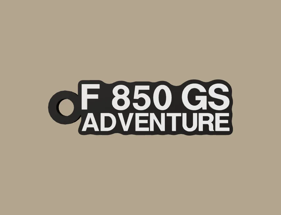 Llavero BMW Motorrad F 850 GS ADVENTURE, base negra y texto blanco, vista frontal del modelo 3D