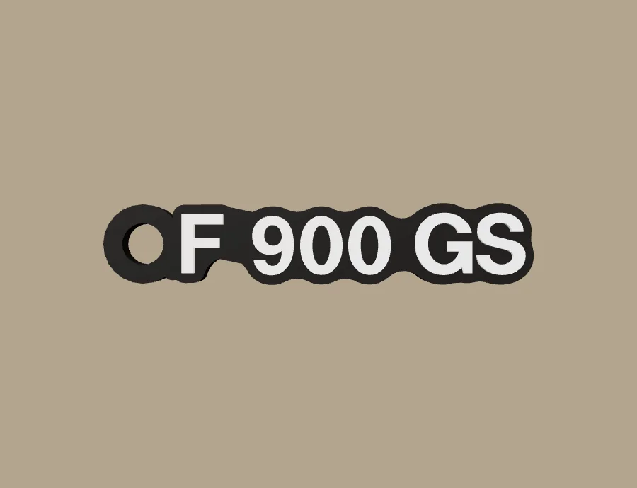 Llavero BMW Motorrad F 900 GS, base negra y texto blanco, vista frontal del modelo 3D