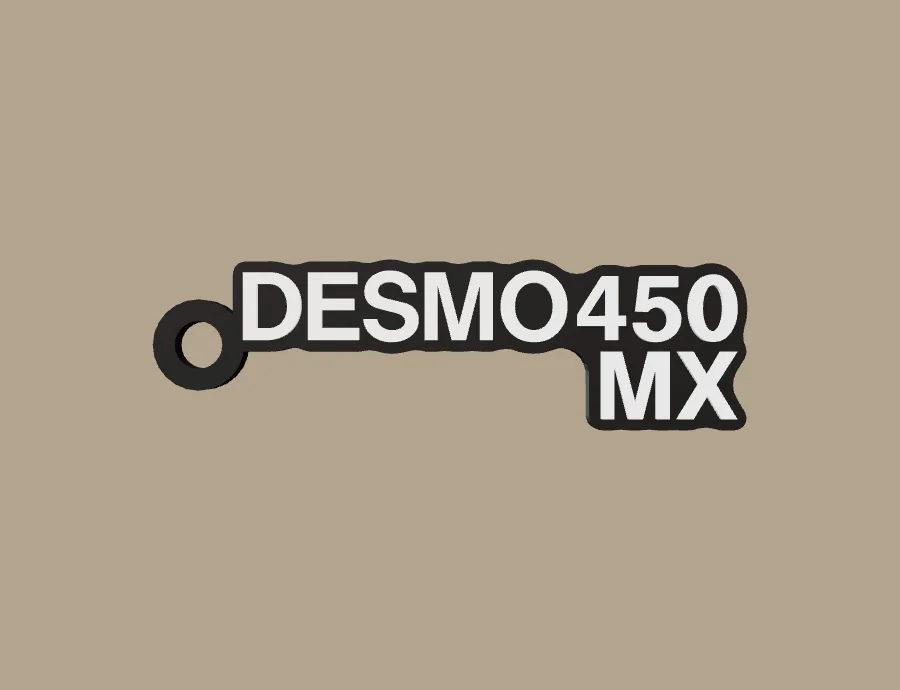 Llavero Ducati DESMO450 MX, base negra y texto blanco, vista frontal del modelo 3D