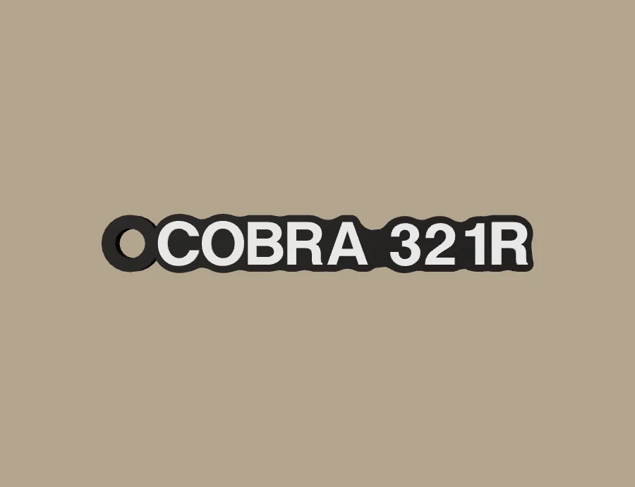 Llavero Kove COBRA 321R, base negra y texto blanco, vista frontal del modelo 3D