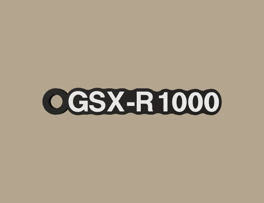 Llavero Suzuki GSX-R1000, base negra y texto blanco, vista frontal del modelo 3D