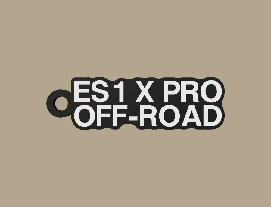 Llavero Tinbot ES1 X PRO OFF-ROAD, base negra y texto blanco, vista frontal del modelo 3D