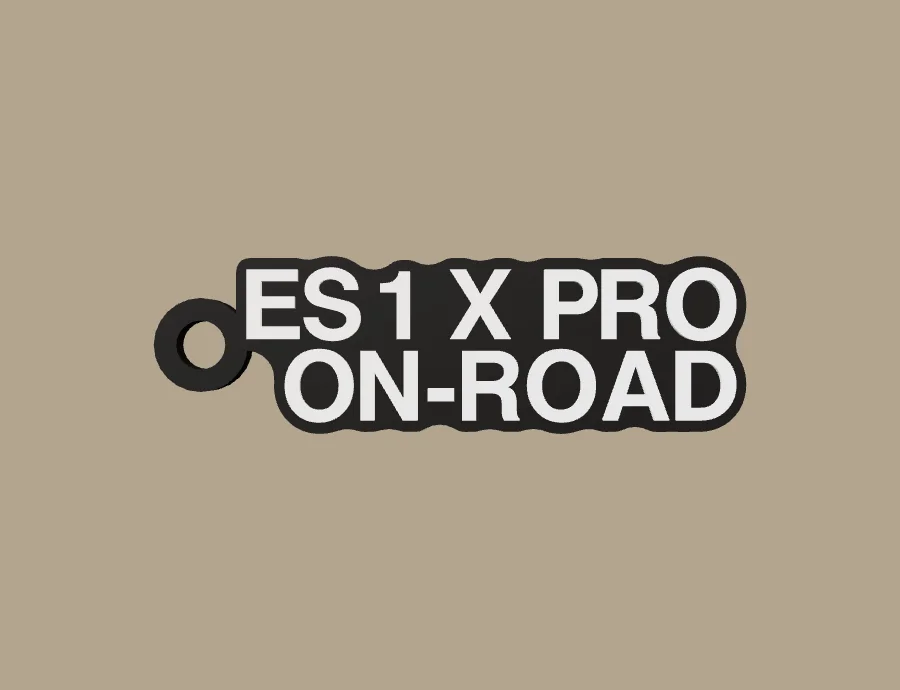 Llavero Tinbot ES1 X PRO ON-ROAD, base negra y texto blanco, vista frontal del modelo 3D