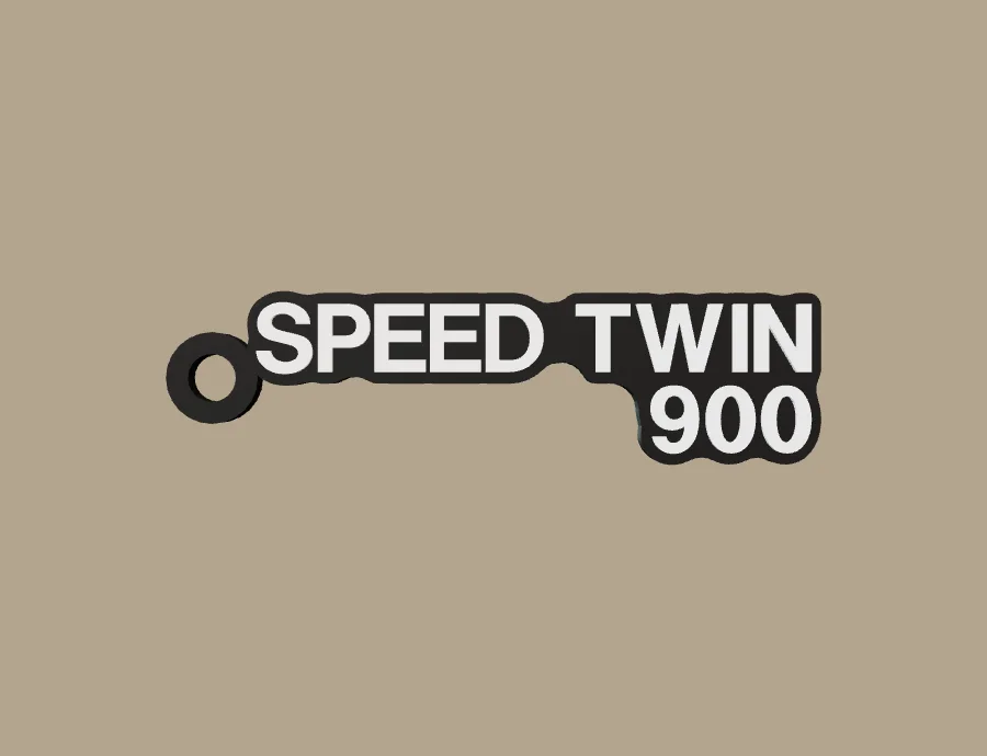 Llavero Triumph SPEED TWIN 900, base negra y texto blanco, vista frontal del modelo 3D