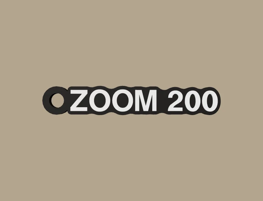 Llavero UM ZOOM 200, base negra y texto blanco, vista frontal del modelo 3D